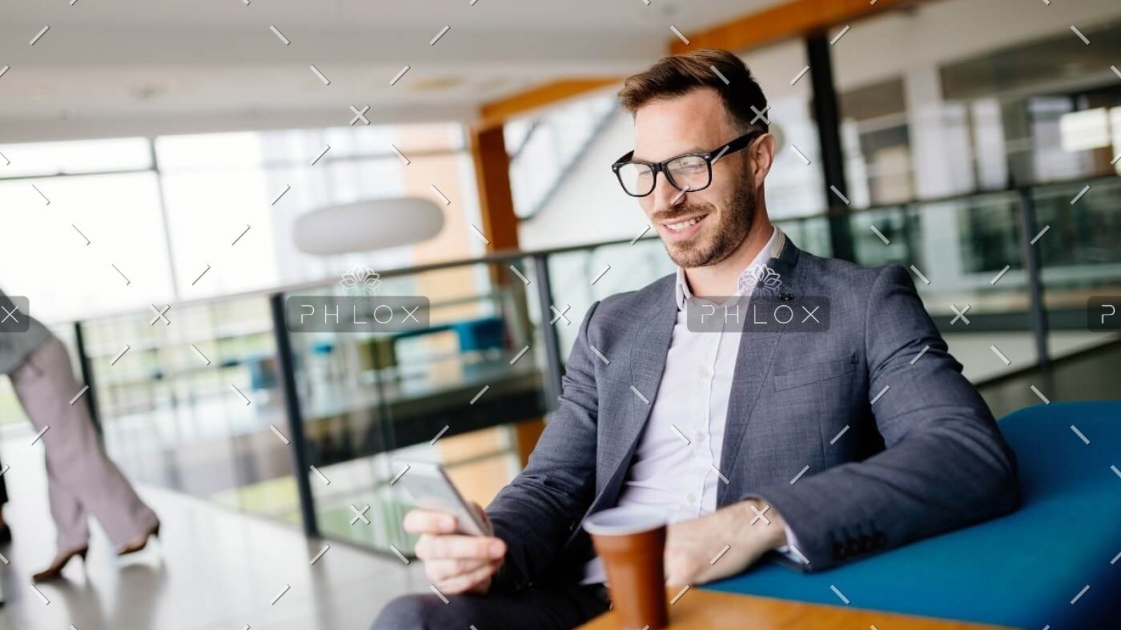 demo-attachment-502-businessman-taking-a-break-with-a-cup-of-coffee-JW4B3DH
